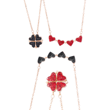 Load image into Gallery viewer, Collana a cuore regolabile a 4 foglie di trifoglio
