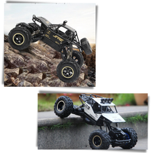 Carica l&#39;immagine nel visualizzatore di Gallery, Auto fuoristrada 4WD telecomandata - Ozerty
